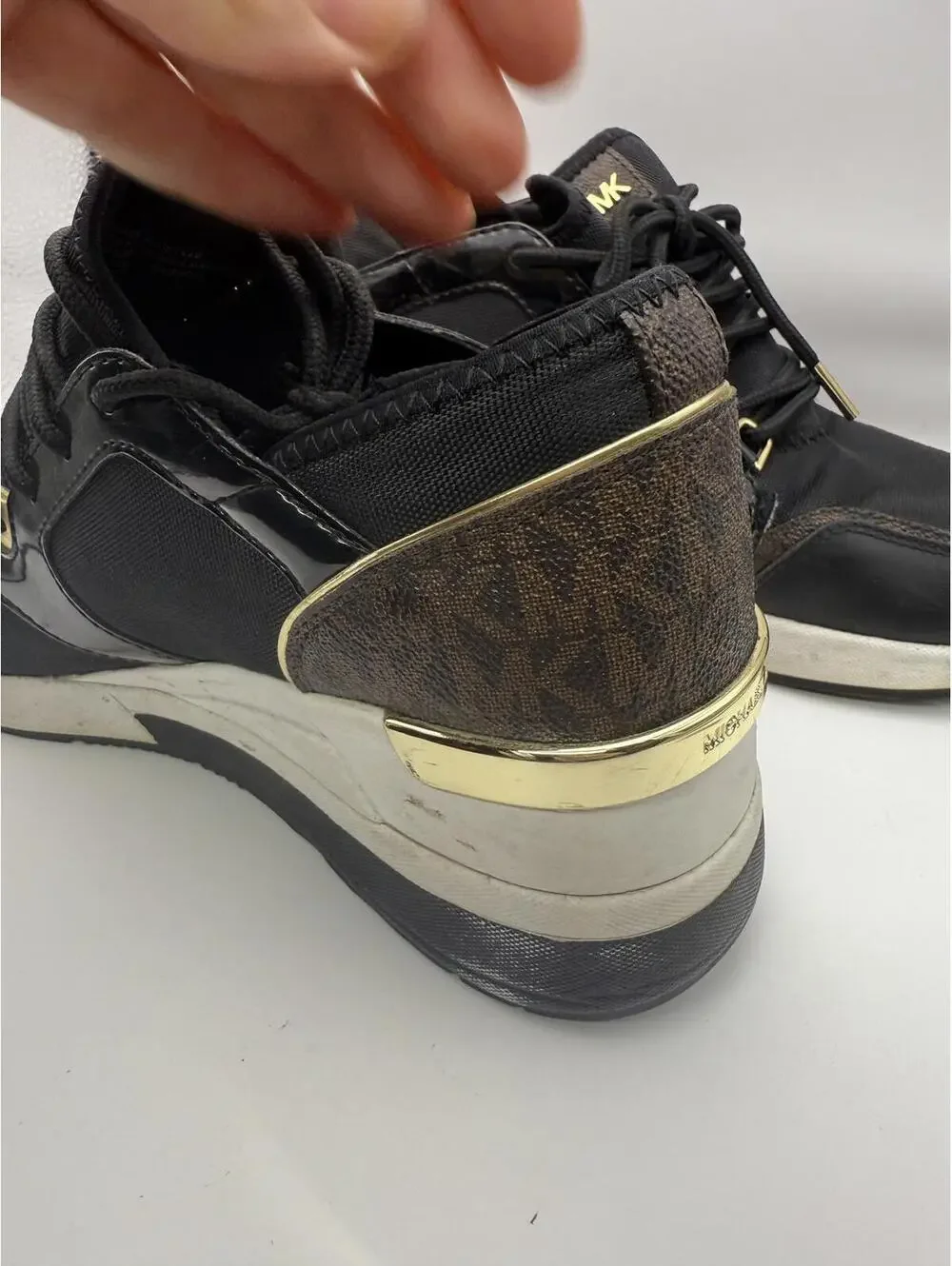 Michael Kors Women's Black and Gold Wedge Sneakers 8.5